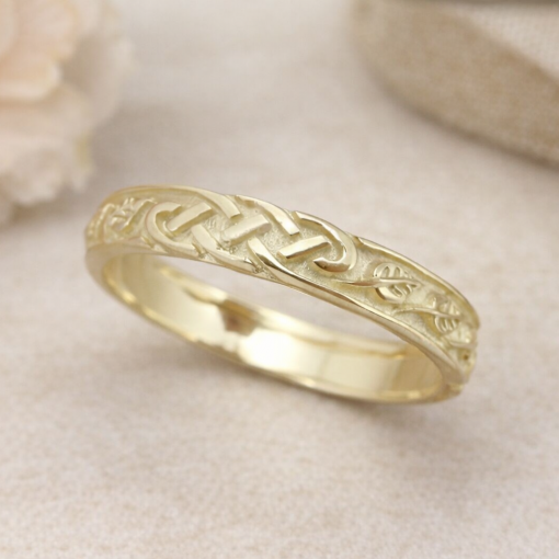 Mens celtic wedding band in 14k yellow gold with nature inspired motive
