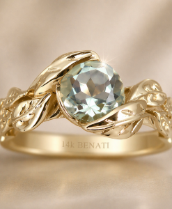 Green amethyst engagement ring with leaves band