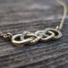 Diamond infinity knot necklace, double infinity knot diamond necklace