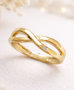 14k yellow gold infinity know band 2026 minimalist style with single diamond pave side