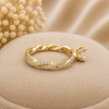 Infinity Diamond Engagement Ring 14K Gold, Twisted Pavé Band, Unique Round Diamond Ring