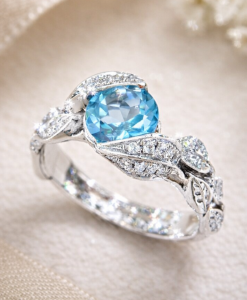 Swiss blue topaz floral nature inspired engagement ring in 14k white gold with accent diamonds by Benati