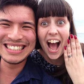Women and man on beach proposal
