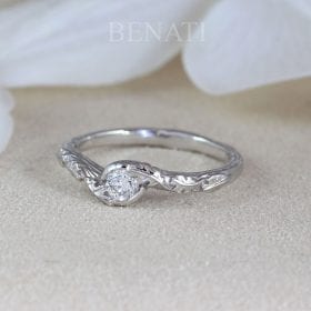 Engagement ring with diamond budget ring