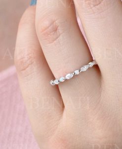 Marquise moissanite and opal eternity wedding band