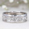 7mm wide mens wedding band with leaves, white gold.