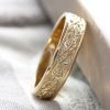 Men's wedding band with leaves
