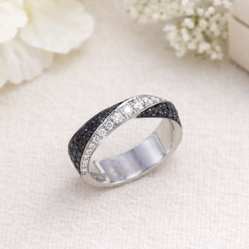 Black and white diamond band ring in white gold, unique crossover design with pave set black diamonds and white diamonds, modern wedding band, elegant stacking ring, minimalist fine jewelry gift