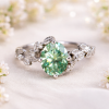 Large oval green moissanite leaves ring with diamond accents nature theme by Benati