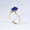 2.3 Carat Lab Sapphire Engagement Ring: 14k Gold Mobius Band, Diamond Accents 2.3 Carat Lab Sapphire Engagement Ring: 14k Gold Mobius Band, Diamond Accents