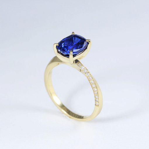 2.3 Carat Lab Sapphire Engagement Ring: 14k Gold Mobius Band, Diamond Accents 2.3 Carat Lab Sapphire Engagement Ring: 14k Gold Mobius Band, Diamond Accents