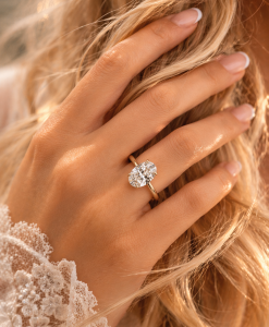 3 carat Oval lab grown diamond smooth band 14k yellow gold engagement ring on wedding model by Benati