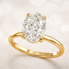 Oval lab grown diamond with smooth band 14k yellow gold engagement ring by Benati